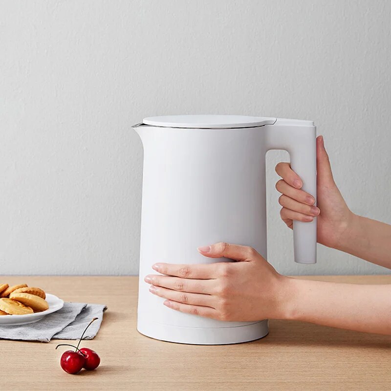 Thermoskanne mit integriertem Wasserkocher